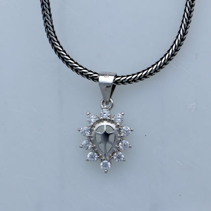 925 Sterling silver diamond pendant with unique tribal design from TRIBAL ORNAMENTS, featuring intricate craftsmanship.