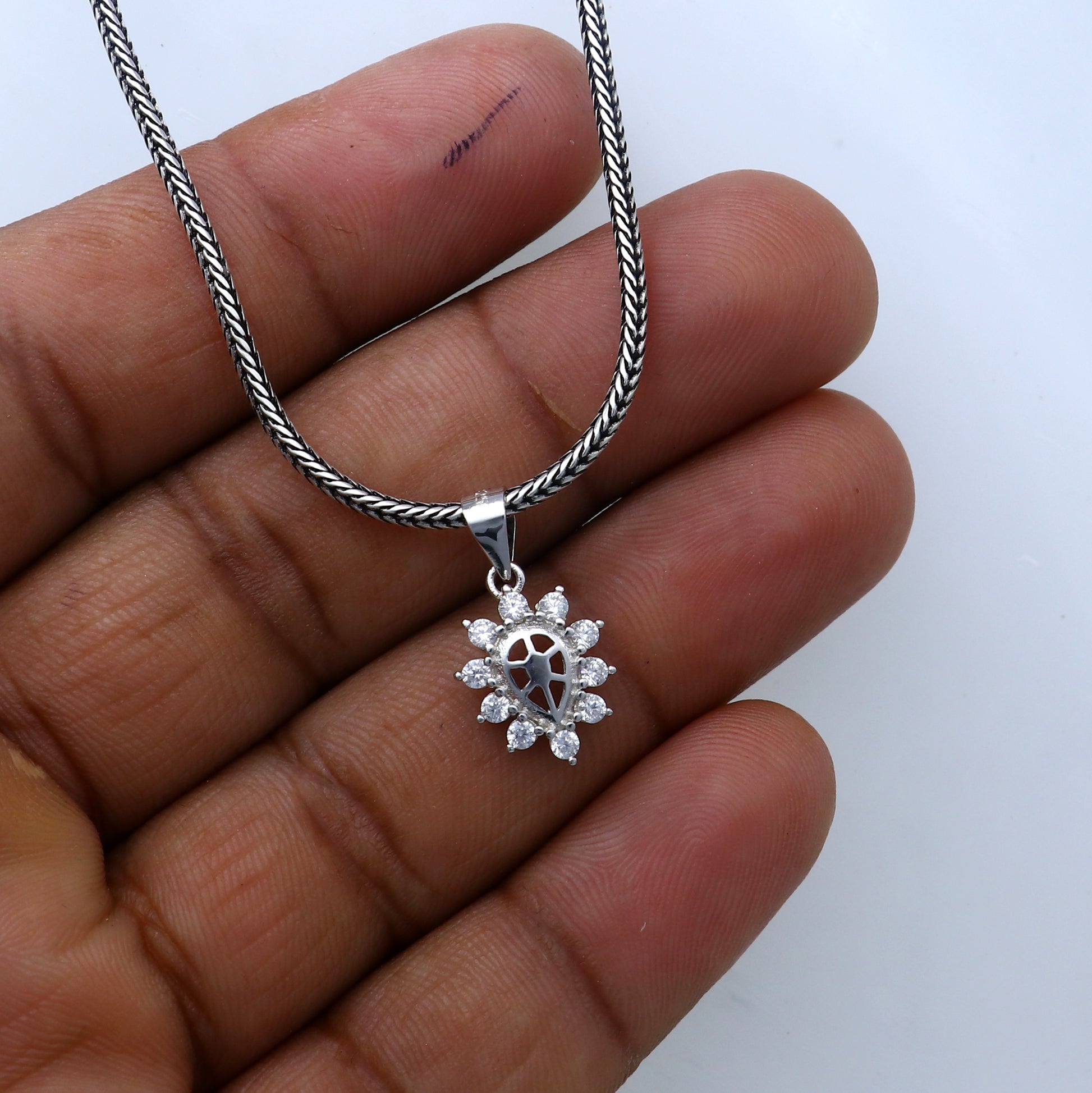 Sterling silver diamond pendant with unique tribal-inspired design, crafted by TRIBAL ORNAMENTS.