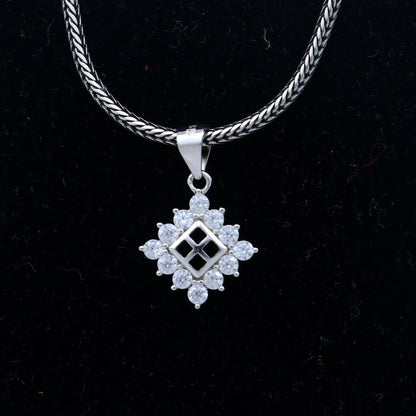 925 Sterling silver diamond pendant with unique tribal design, crafted by TRIBAL ORNAMENTS, featuring intricate detailing.