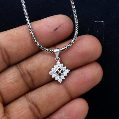 925 Sterling silver diamond pendant with a unique tribal design, featuring intricate craftsmanship, by TRIBAL ORNAMENTS.