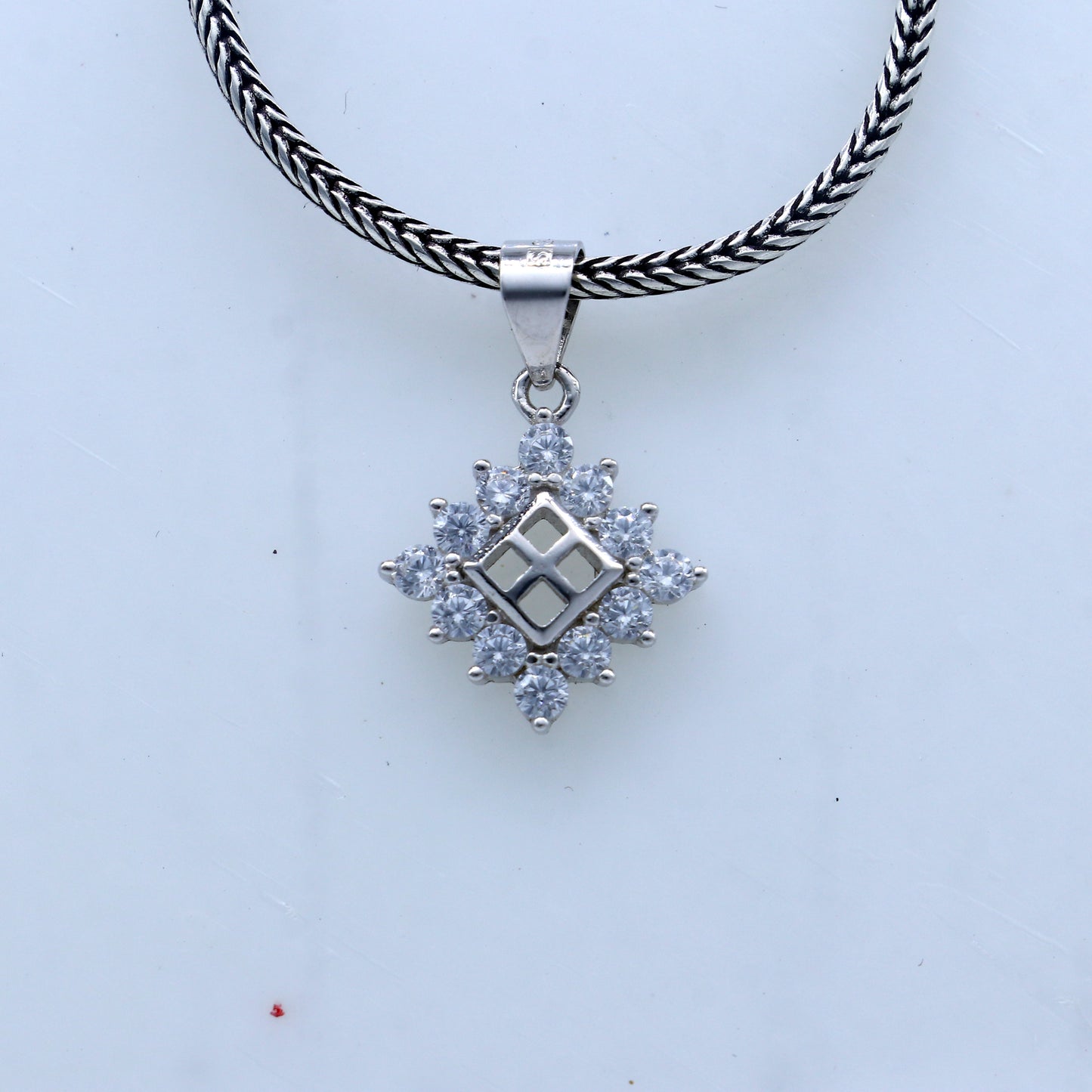 925 Sterling silver diamond pendant with a unique tribal design by TRIBAL ORNAMENTS.
