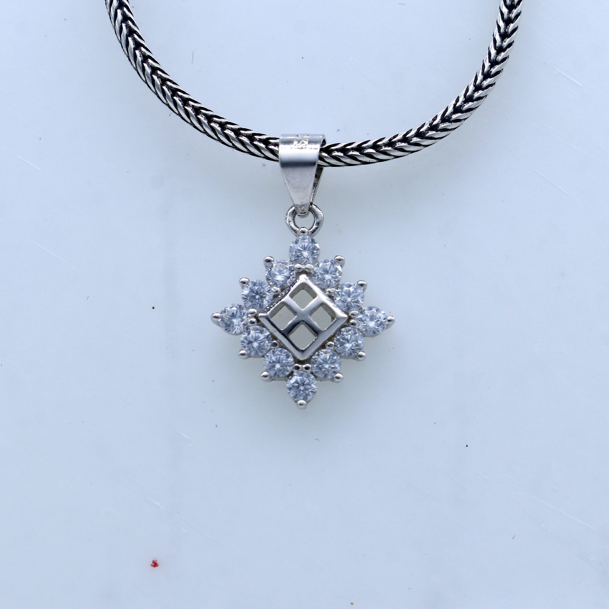 925 Sterling silver diamond pendant with a unique tribal design by TRIBAL ORNAMENTS.