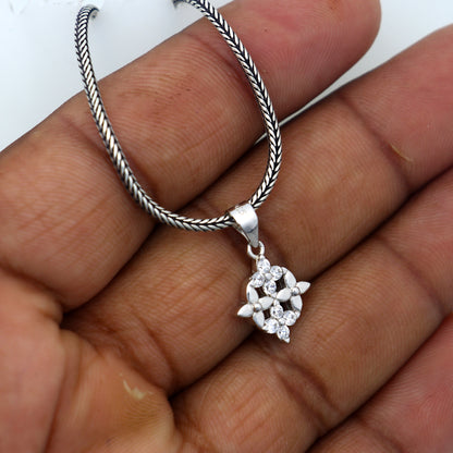 925 Sterling silver unique diamond pendant with tribal design from TRIBAL ORNAMENTS, showcasing intricate craftsmanship and sparkling diamonds.