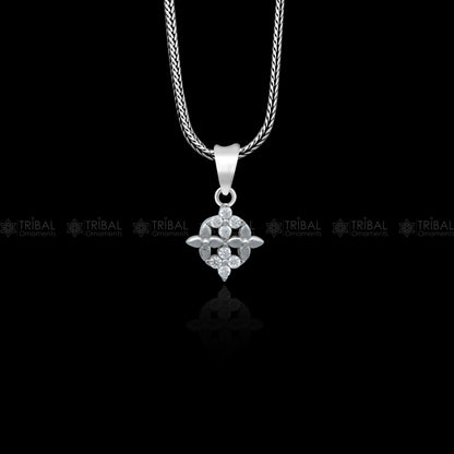 925 Sterling silver unique diamond pendant by TRIBAL ORNAMENTS featuring intricate tribal design and sparkling diamonds.