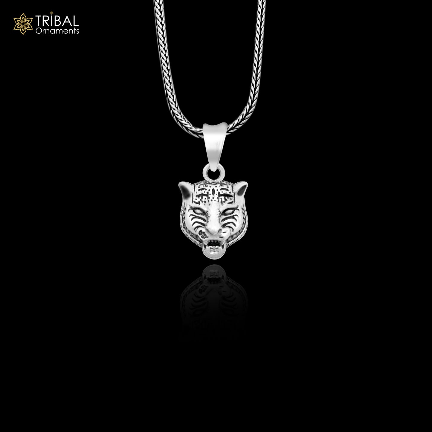 925 sterling silver lion face pendant by TRIBAL ORNAMENTS, featuring detailed lion head design for animal jewelry enthusiasts.