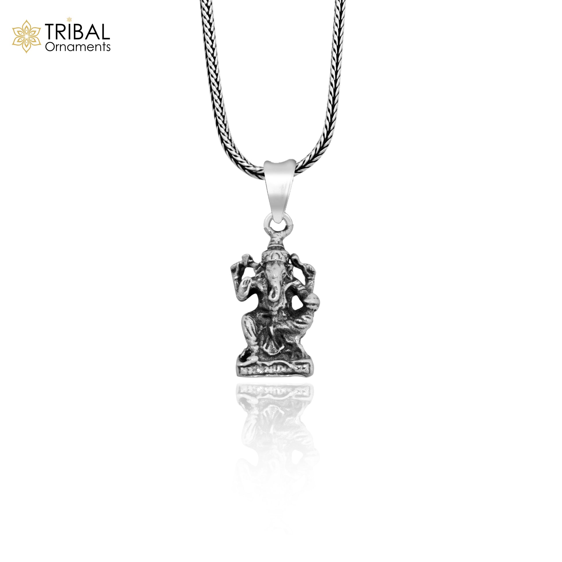 Elegant 925 sterling silver Lord Ganesha blessing pendant from TRIBAL ORNAMENTS, featuring intricate divine design in handmade Indian jewelry
