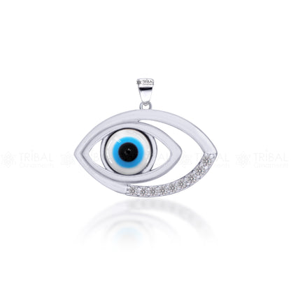 Pure 925 sterling silver evil eye pendant with CZ stone from TRIBAL ORNAMENTS, featuring intricate tribal design and sparkling accents.