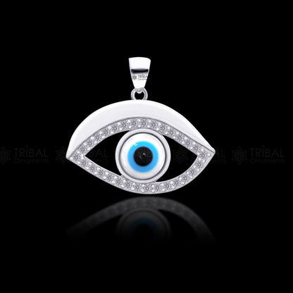 Pure 925 sterling silver evil eyes pendant with CZ stone from TRIBAL ORNAMENTS, featuring a detailed design and sparkling gemstone.