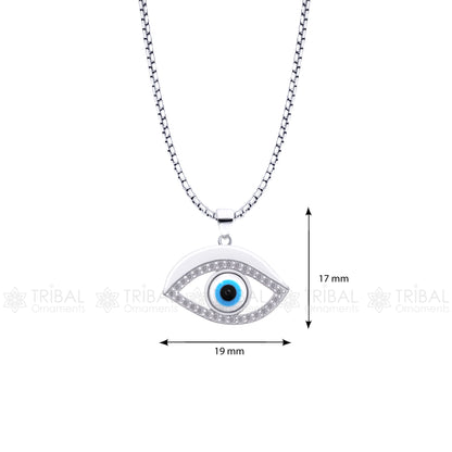 Pure 925 sterling silver evil eyes pendant with CZ stone from TRIBAL ORNAMENTS, featuring intricate tribal design and sparkling accents.