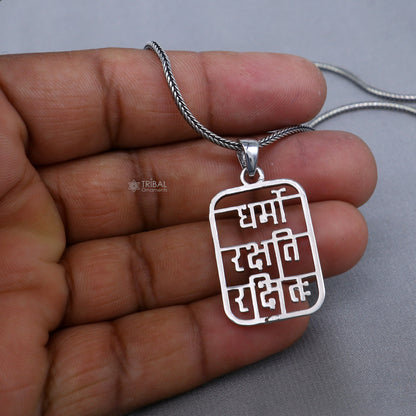 Handmade 925 sterling silver "Dharmo Rakshathi Rakshitaha" pendant by Tribal Ornaments, featuring intricate tribal silver craftsmanship.