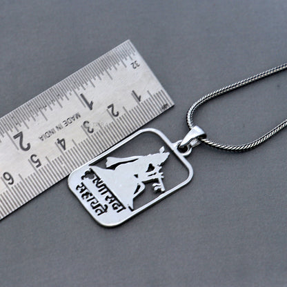 Sterling silver Krishna mantra pendant featuring hand-crafted design and intricate details, by Tribal Ornaments.