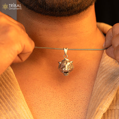 Sterling silver lion face pendant by TRIBAL ORNAMENTS, symbolizing courage, strength, and leadership in detailed craftsmanship.