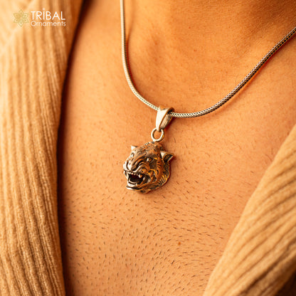 925 sterling silver lion face pendant from TRIBAL ORNAMENTS, symbolizing courage, strength, and leadership.