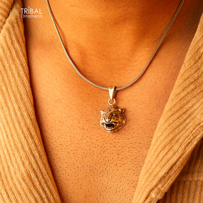 Sterling silver lion face pendant by TRIBAL ORNAMENTS, symbolizing courage, strength, and leadership in detailed craftsmanship.