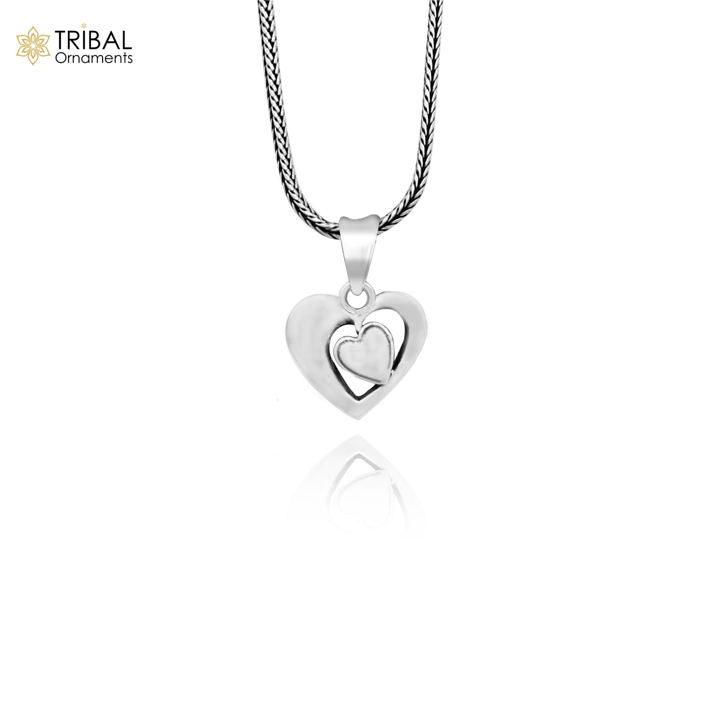 Sterling silver heart pendant necklace by TRIBAL ORNAMENTS, unisex jewelry with a unique design perfect for gifting and love.