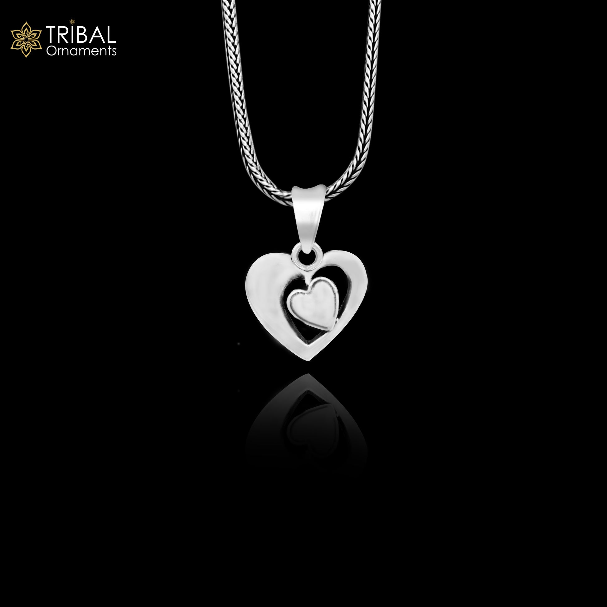 Sterling silver heart pendant necklace by Tribal Ornaments featuring a unique unisex design, perfect for gifting or everyday wear.