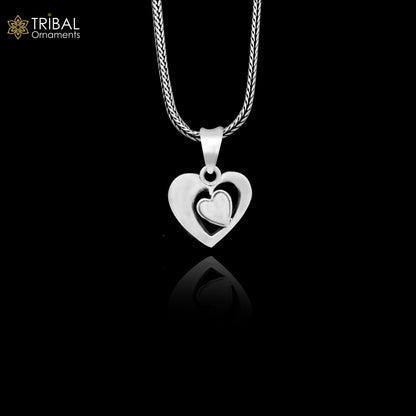 Sterling silver heart pendant necklace by Tribal Ornaments featuring a unique unisex design, perfect for gifting or everyday wear.