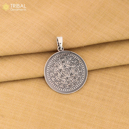 Small 925 silver Divine Sudarshan Chakra Yantram pendant with intricate design, energetic Kavacham symbol, by Tribal Ornaments.