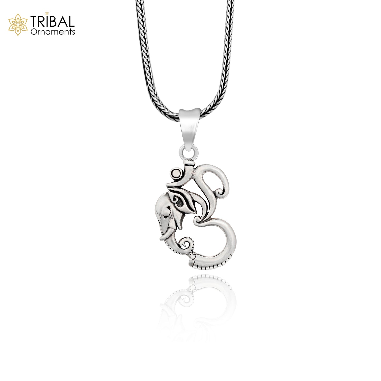 Sterling silver vintage Ganesha pendant by TRIBAL ORNAMENTS, unisex handmade jewelry with personalized design and intricate detailing.