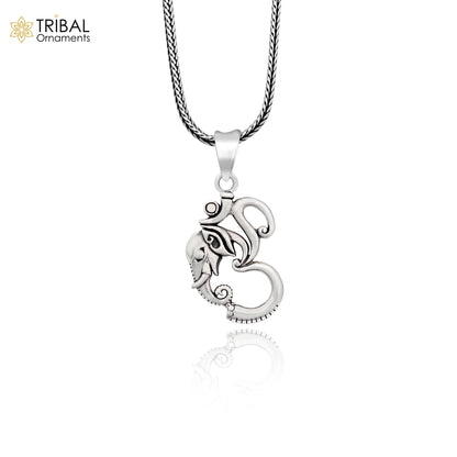 Sterling silver vintage Ganesha pendant by TRIBAL ORNAMENTS, unisex handmade jewelry with personalized design and intricate detailing.