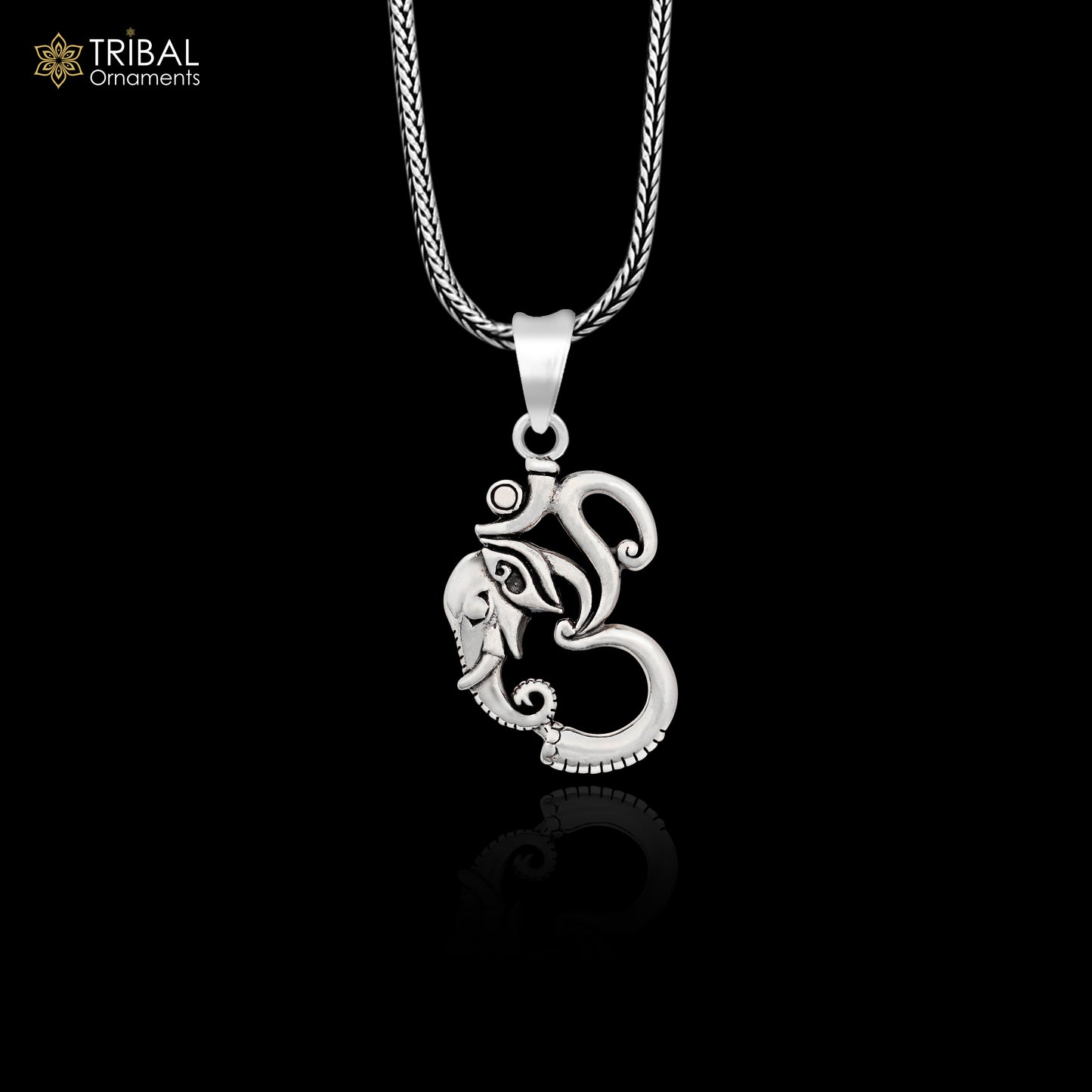 Sterling silver vintage Aum Ganesha pendant by Tribal Ornaments, featuring handmade unisex personalized jewelry design.