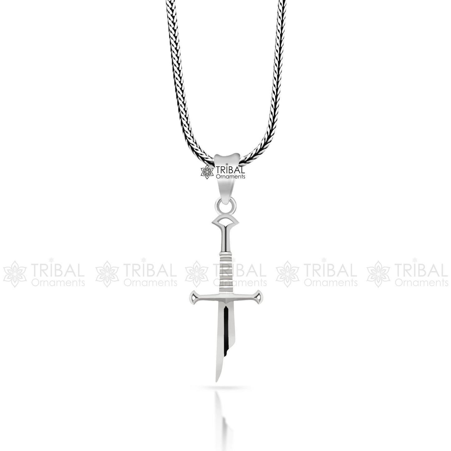 925 sterling silver small sword pendant by TRIBAL ORNAMENTS, handmade unisex jewelry with white finish and intricate design.