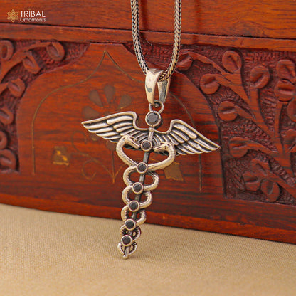 Sterling silver Caduceus symbol doctor pendant with chain, tribal jewelry design featuring white stone details.