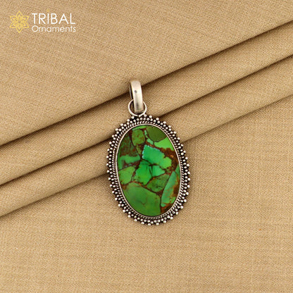 Unisex tribal jewelry featuring a round 925 sterling silver pendant with green turquoise stone on an 18-inch chain.