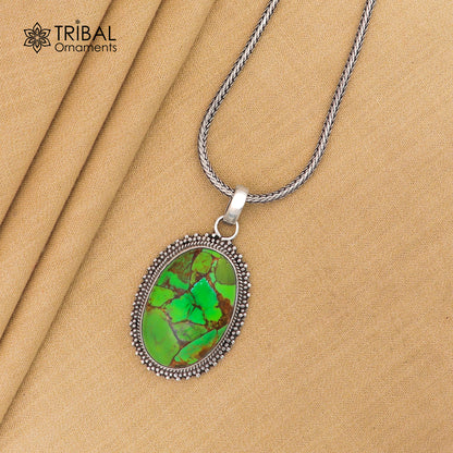 Unisex tribal jewelry featuring a round green turquoise pendant on a silver chain, crafted from 925 sterling silver by Tribal Ornaments.