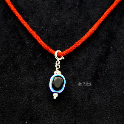 Sterling silver Evil Eye pendant by Tribal Ornaments featuring a modern, trendy design to ward off negativity.