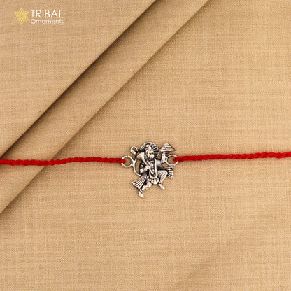 925 silver Flying Hanuman idol Rakhi with red thread, traditional Indian bracelet from Tribal Ornaments for Raksha Bandhan.