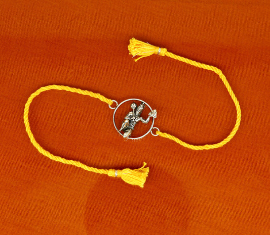 925 sterling silver Hanuman idol bracelet with red thread rakhi, tribal ornaments design, featuring intricate craftsmanship and vibrant red thread.