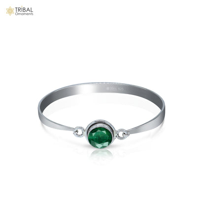 Sterling silver tribal kada bracelet with red stone, stylish bangle jewelry by Tribal Ornaments featuring intricate design.