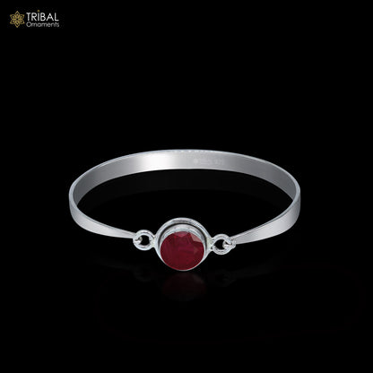 Sterling silver red stone kada bangle bracelet with tribal design by TRIBAL ORNAMENTS, showcasing traditional tribal jewelry style.