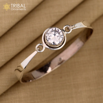 Sterling silver tribal kada bracelet with a red stone, stylish and intricate design from Tribal Ornaments.