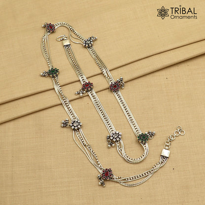 Sterling silver adjustable vintage-style belly chain with red stones, featuring a multi-line tribal design for waist or saree adornment.