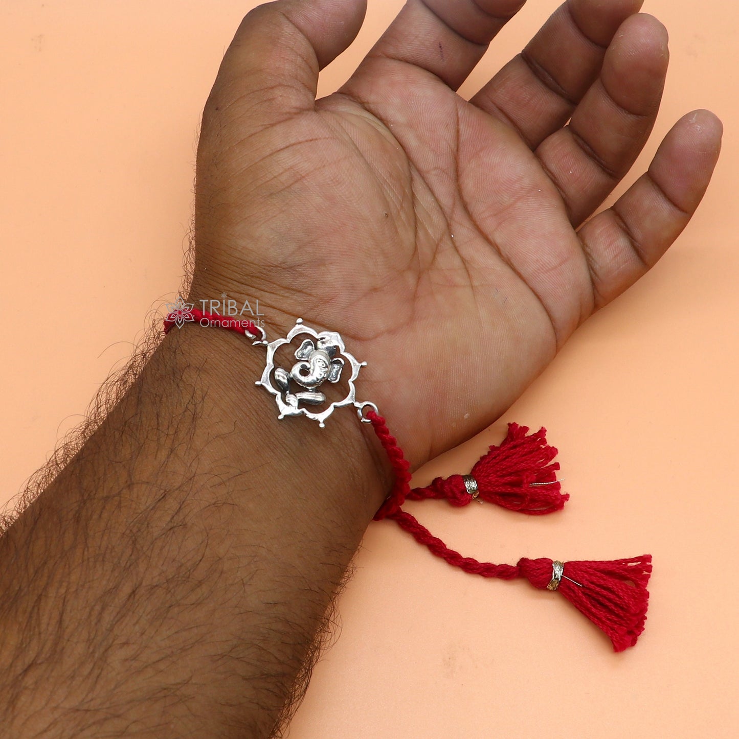 925 Sterling silver Lord Ganesha thread bracelet with red thread and pendant, crafted by TRIBAL ORNAMENTS.
