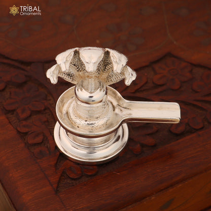 Shiny 925 sterling silver Lord Shiva Lingam from TRIBAL ORNAMENTS, ideal for home temple worship and divine decor.