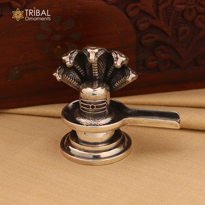 Shiny 925 sterling silver Lord Shiva Lingam from Tribal Ornaments, suitable for home temple worship.