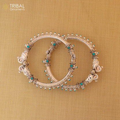 Sterling silver peacock design tribal belly dance bangle with cubic zircon stones, featuring intricate ethnic jewelry craftsmanship.