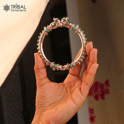 Sterling silver peacock design ethnic belly dance bangle with cubic zircon stones, featuring intricate tribal ornament details.