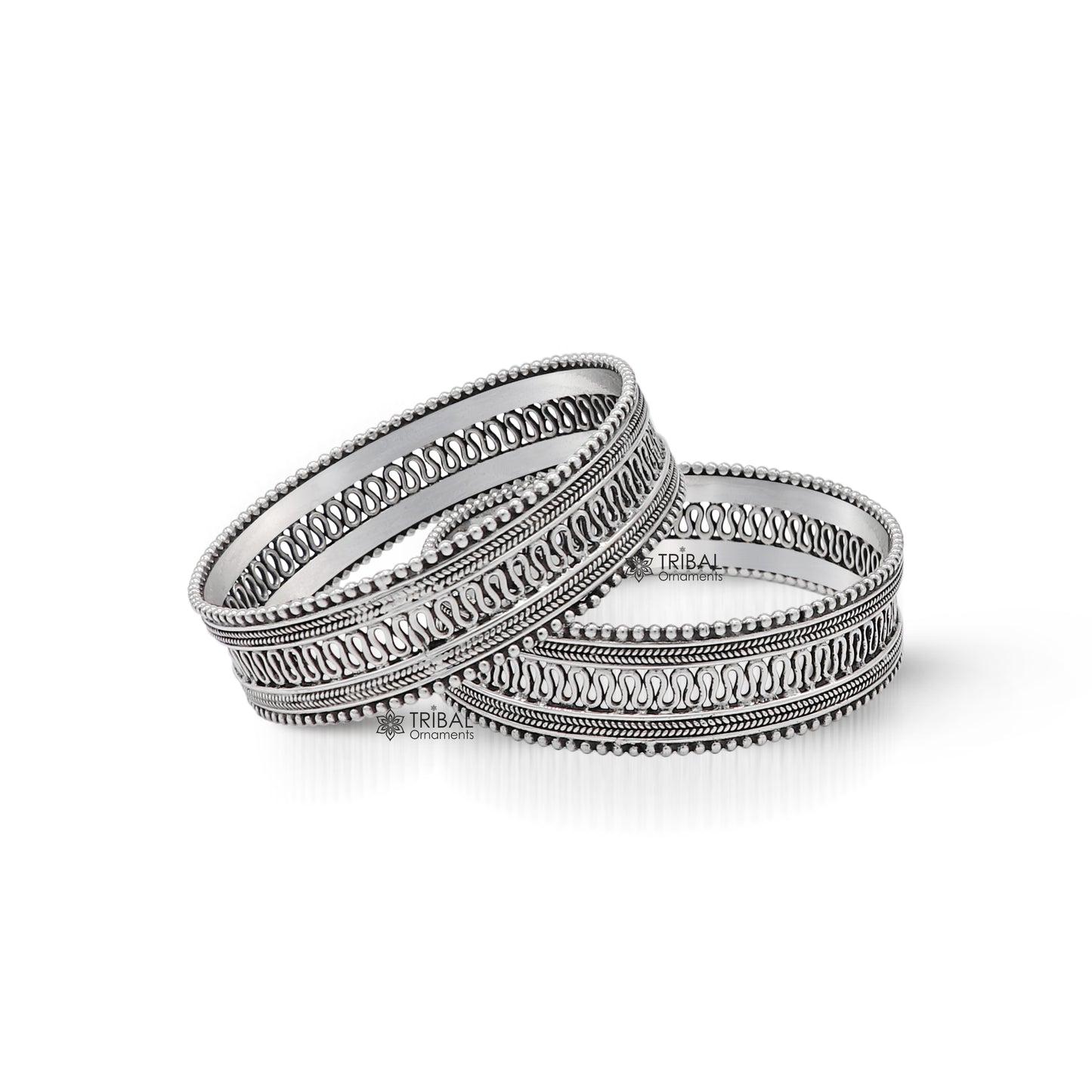 Sterling silver handmade vintage bangle bracelet with intricate filigree tribal design, ideal for ethnic jewelry and special occasions.