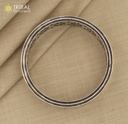 Sterling silver floral bangle bracelet by TRIBAL ORNAMENTS featuring vintage design, delicate floral pattern, perfect for brides.
