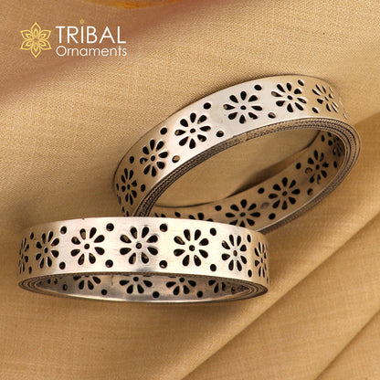 Vintage 925 sterling silver floral bangle bracelet by TRIBAL ORNAMENTS, featuring intricate floral design for brides and special occasions.
