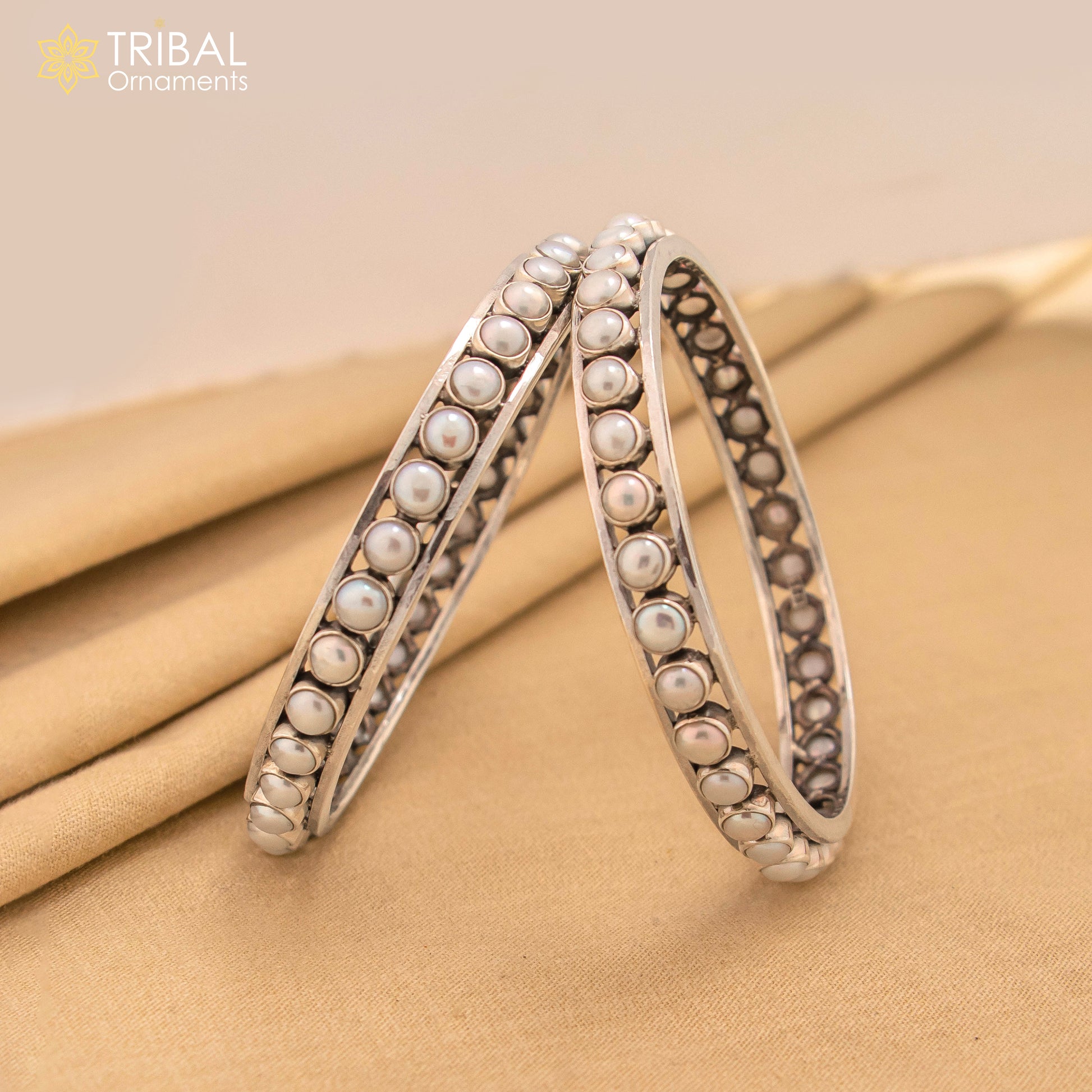 925 sterling silver pearl bangle bracelet by Tribal Ornaments featuring oxidized, customized bridal design and elegant craftsmanship.