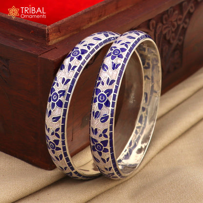Sterling silver handcrafted bangles with multicolor enamel flower design, showcasing tribal ornament style bracelet.