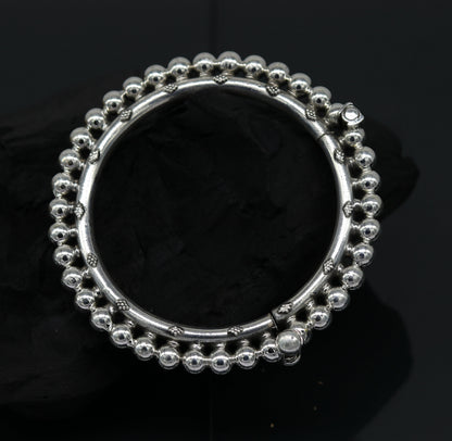 Sterling silver beaded bangle bracelet with customized tribal design by TRIBAL ORNAMENTS, perfect for bridesmaids or gifts.