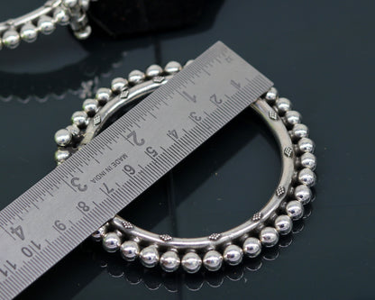Handmade 925 sterling silver beaded bangle bracelet with customized tribal design, perfect as bridesmaid or tribal jewelry gift