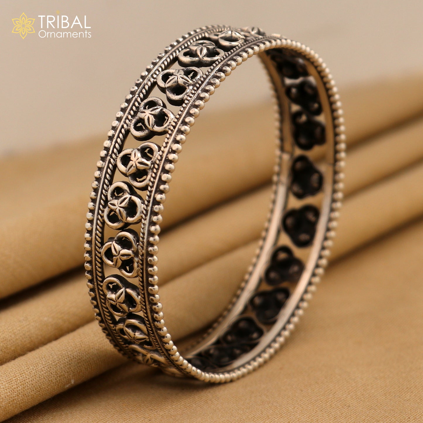 925 sterling silver tribal bangle bracelet with trendy cultural design, featuring intricate tribal jewelry patterns.