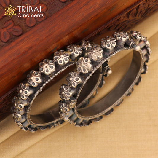 Sterling silver tribal floral bangle bracelet with intricate design, perfect for bridal wedding jewelry from TRIBAL ORNAMENTS.